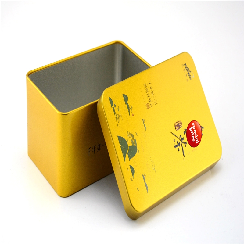 Caja rectangular de lata de té con acabado metálico dorado