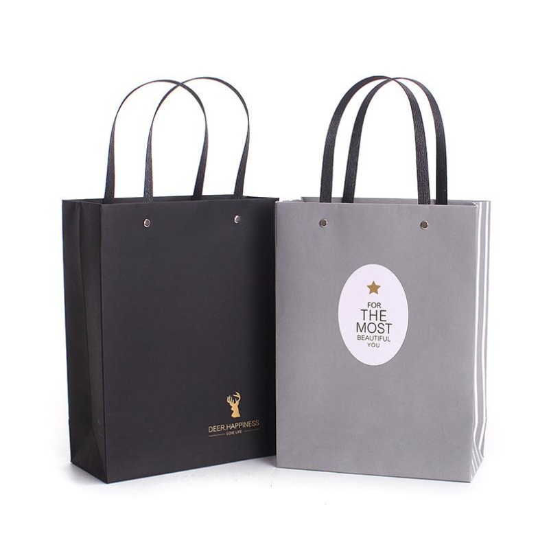bolsa de papel de regalo de lujo de sellado caliente de la hoja de oro