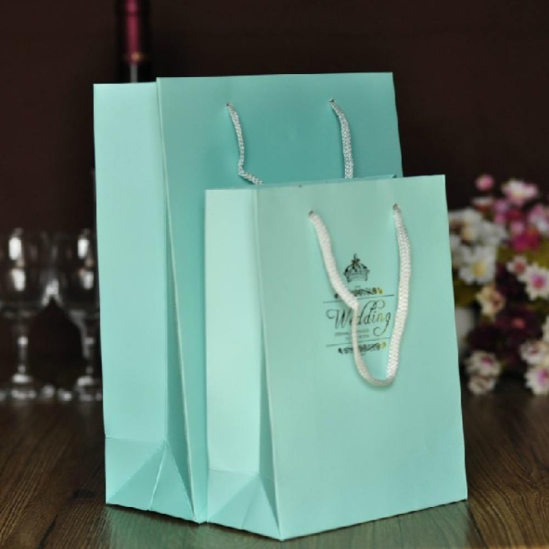 bolsa de papel de regalo de lujo de sellado caliente de la hoja de oro