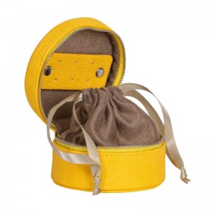 Caja de joyería redonda amarilla