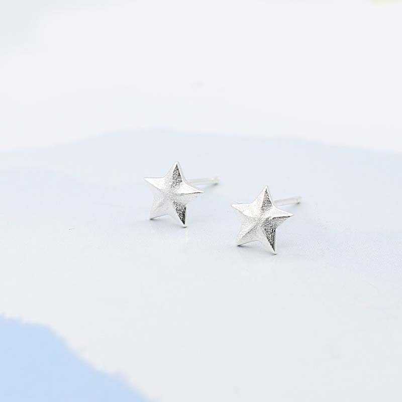 S925 Joyas de plata para la oreja Star Grinding Ear Nail Simple pequeña joyería