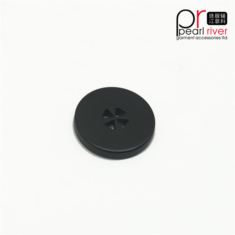 Botón de prenda redonda de color negro de última calidad.