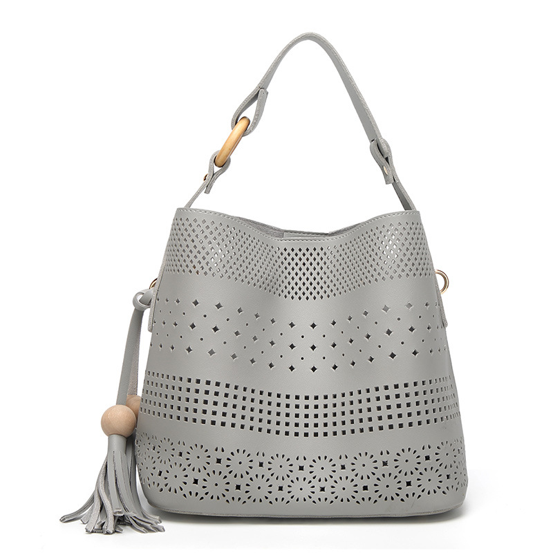 HD0827 - Bolso al por mayor ahuecado de cuero de la PU para las mujeres que hacen compras