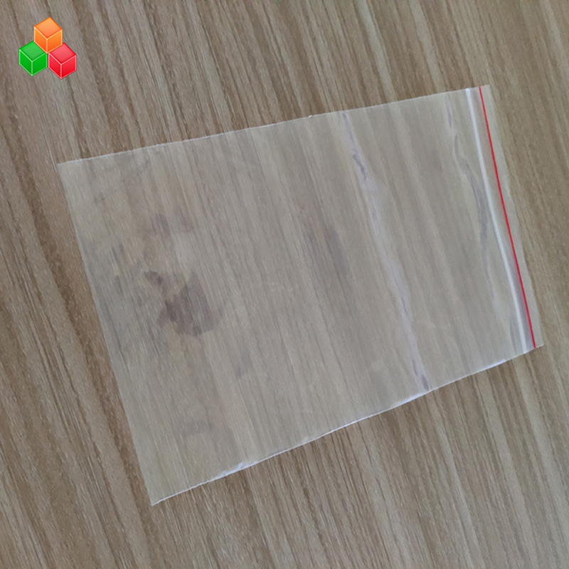 Precio de fábrica tamaño de impresión personalizado reutilizable sello de prensa transparente plástico PE PP zip lock bolsa de embalaje para alimentos / prendas de vestir