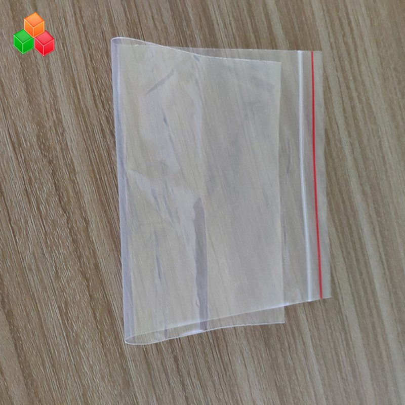 Precio de fábrica tamaño de impresión personalizado reutilizable sello de prensa transparente plástico PE PP zip lock bolsa de embalaje para alimentos / prendas de vestir