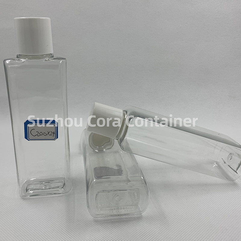Una botella de maquillaje plástico de 24 mm PET de tamaño cervical de 200 mm con una tapa giratoria.