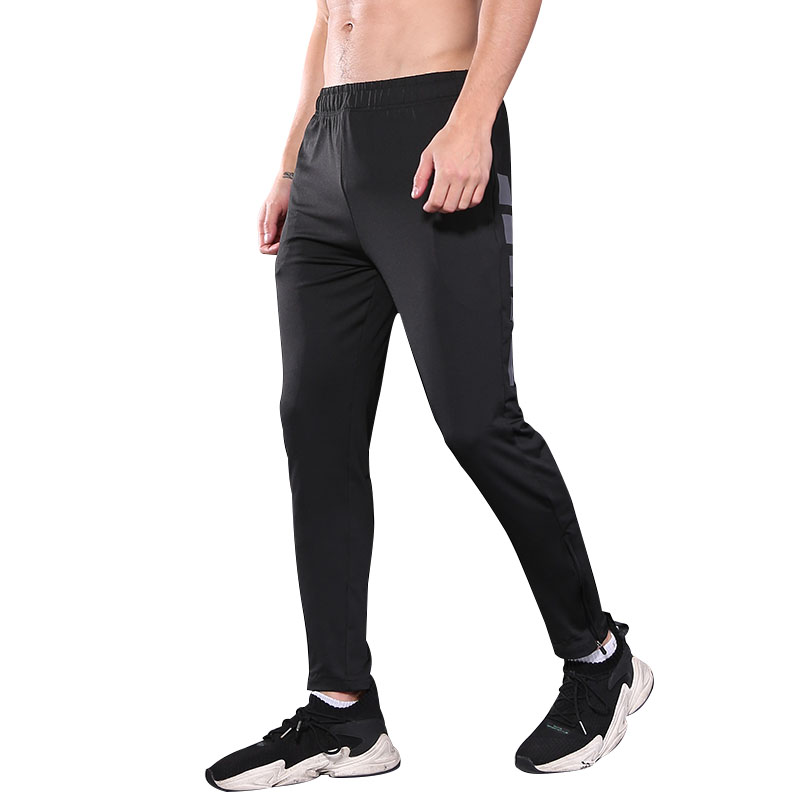 Pantalones de gimnasia, bolsillos de cremallera.