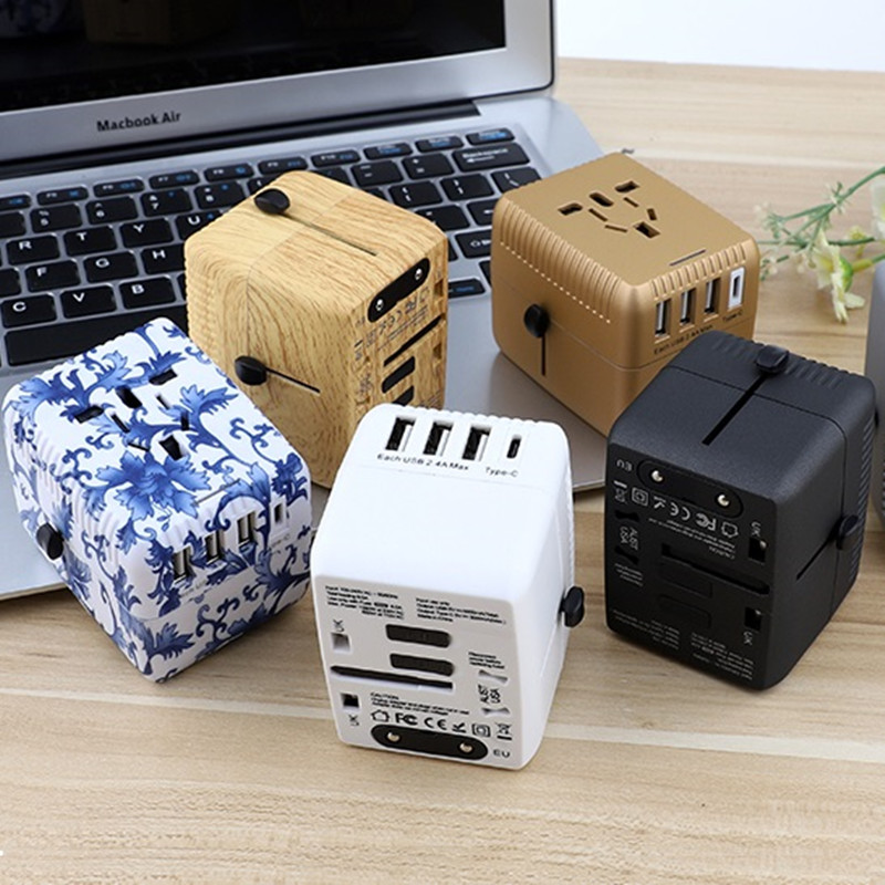 UNIVERSAL TRAVEL Adapter, International Electric Power Adapter, Global enchufe with four USB Ports, High - level 5a Square charger, Integrated Interface for Mobile Notebook Computer for America, Britain, Australia, Europe, Asia