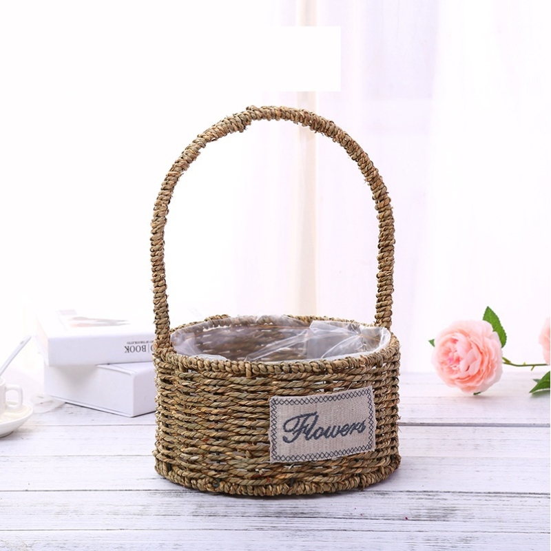 Cesta de flores circular con asa