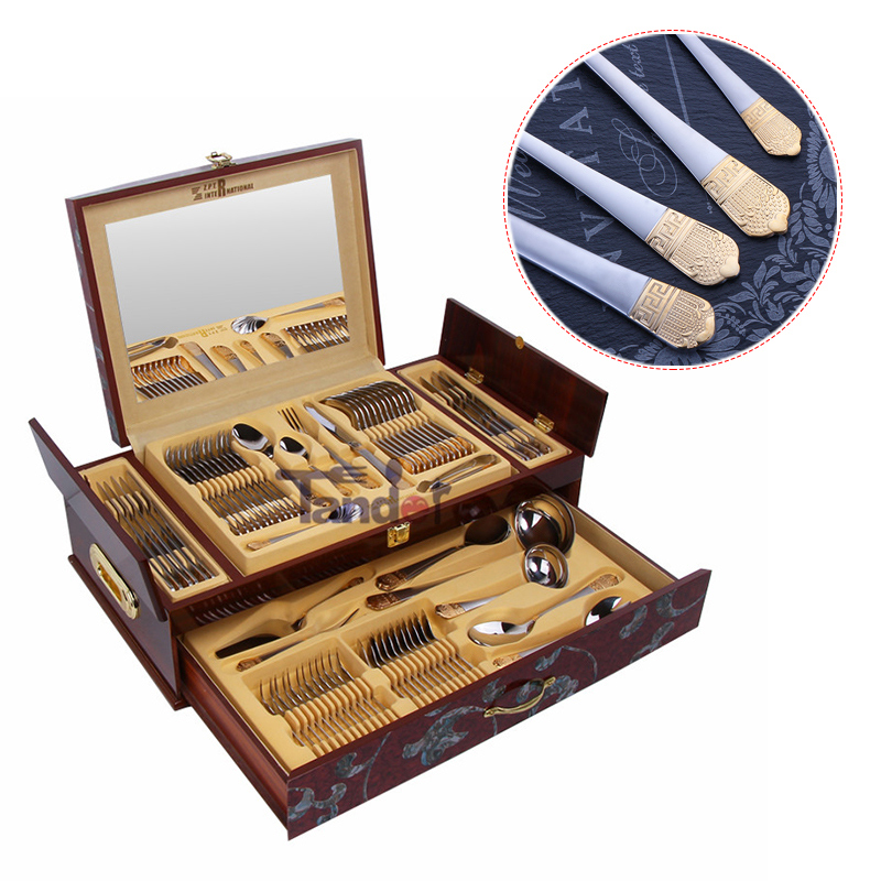 Setenta y dos cubiertos de acero inoxidable de la Corona, cubiertos dorados de lujo, cajas de madera.