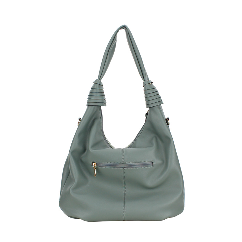 La mujer de la moda, bolso de vagabundo, bolso de bolsillo blando.