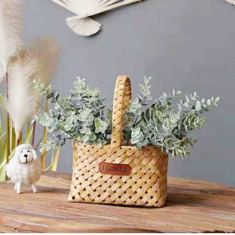 Manejar la cesta de la flor