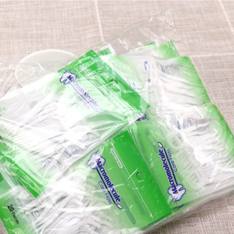 Etiqueta privada de alta calidad 20 PCS bolsa de embalaje dental hilo dental palillos al por mayor de hilo dental barato
