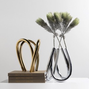 Jarrón de arco de metal