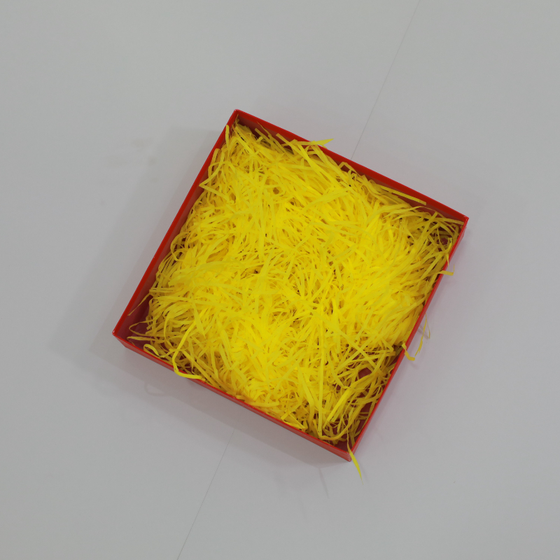 Papel rallado de llenado amarillo