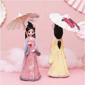 Chica delicada con paraguas