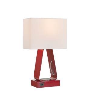 Pequeña lámpara de escritorio con acabado rojo, un puerto de carga USB, una estación de carga inalámbrica y un interruptor de balancín en/off en la sala de visitas