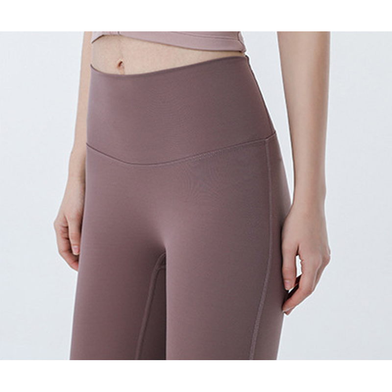 Pantalones de yoga de bolsillo de levantamiento de glúteos sin costura