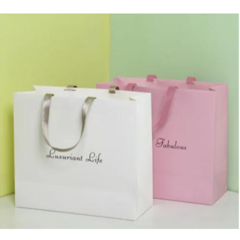 Bolsas de regalo de logotipo personalizadas de alta calidad con mango impreso en la bolsa de papel de compranavideña